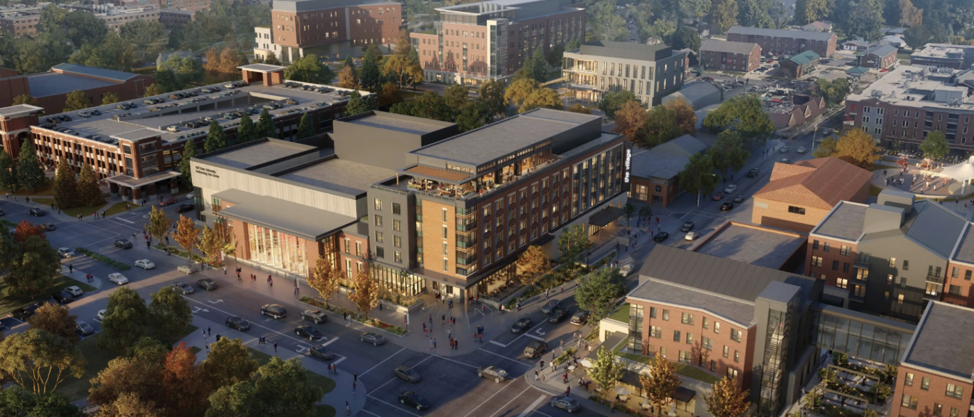 A rendering of the new Performing Arts Center and Cantio Hotel at Ball State’s University in Muncie, Ind., which will enrich art and culture and stimulate the local economy. The rendering shows the building in the center of a street with lights and nature surrounding it.